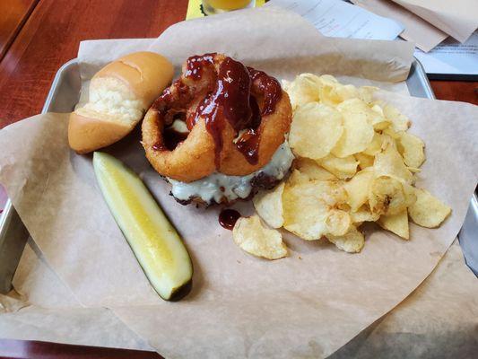 6oz. smash burger with Cooper Cheese, thick onion rings and slathered with BBQ sauce.