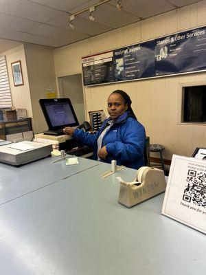 this employee is the worst she yelled and refused to fix her mistake this reflects poorly on all postal office workers