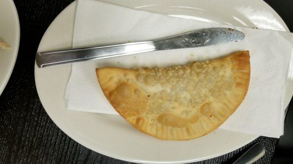 Beef empanada. Huge. See knife next to it for reference. Love that it wasn't oily. The beef inside was moist and juicy, not dry AT ALL.