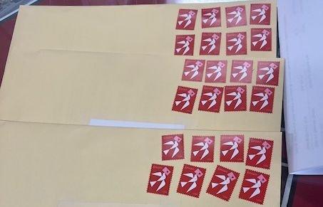 The 24 forever stamps they sold me at 70 cents each.  $5.60 per envelope.