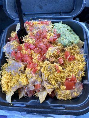 "Veggie taco salad" minus the sour cream and minus rice. It was served on a bed of lettuce that you can't see here. Yum!