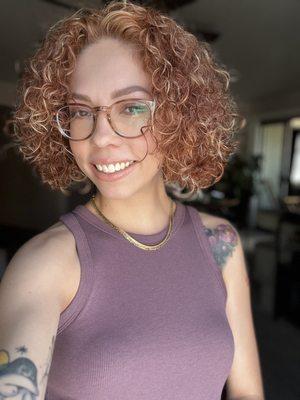 Curly cut + copper color with highlights