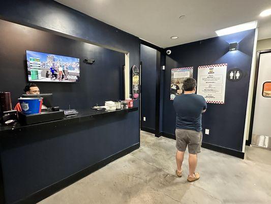 Ordering counter in the back corner of the bar