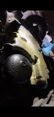 Oil filter housing covered in oil.  Oil all underneath car.