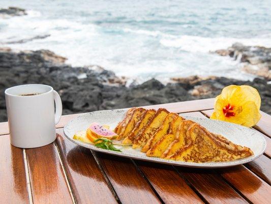 Delicious breakfast French toast and coffee with scenic views of the Pacific Ocean