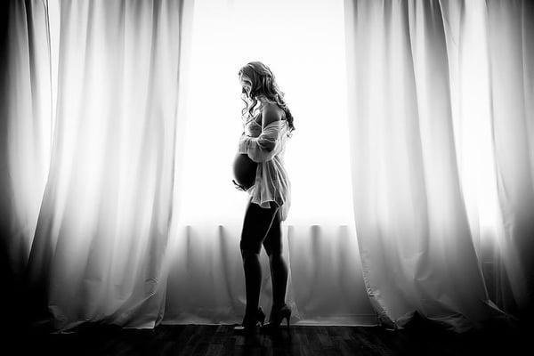 Silhouette maternity photography in black and white.