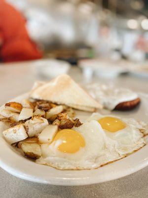 Fried chicken steak, eggs, potatoes, hash, gravy