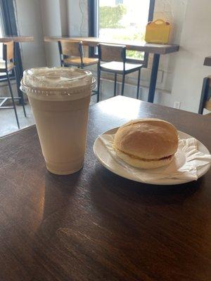 Egg and cheese sandwich with iced lavender honey latte