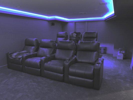 Basement remodel into a home in theater