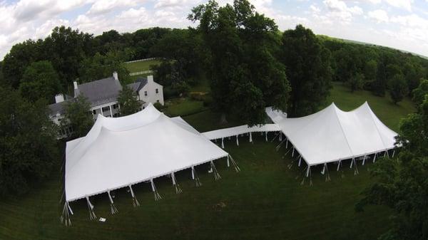 Aerial view of a residential tented wedding