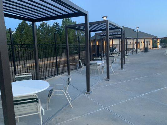 The black iron fence behind the cabanas was the installed fence.