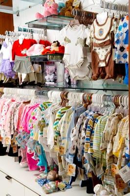 An array of preemie and infant outfits including Kissy Kissy, Vitamin Baby, Itty Bitty Baby,  etc.