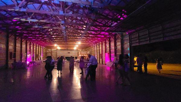 Up lighting and lighting near the end of this large warehouse Quinceñera Party with DJ Emir of Denver's Best DJs