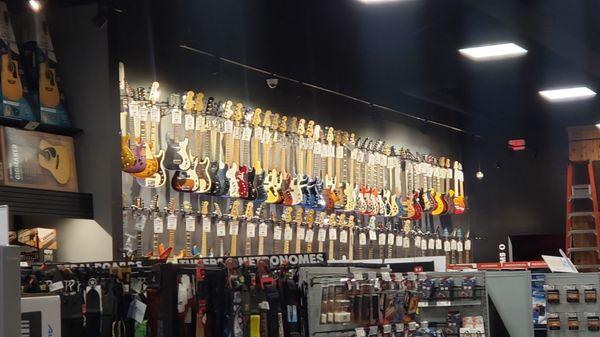 Wall of more guitars