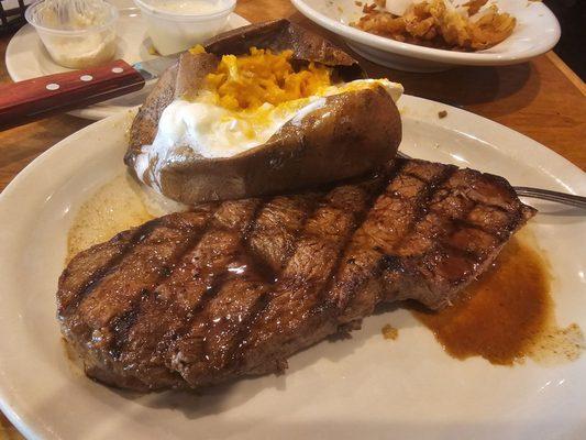 Perfectly cooked sirloin with a sweet potato. Yumm