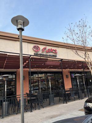 Signage atop outdoor patio seating