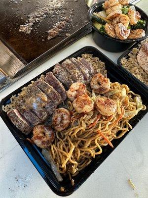 Fried rice and spicy noodles with New York steak and shrimp