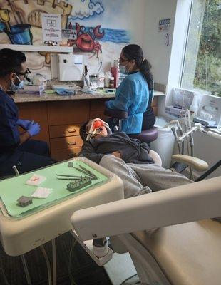 Extraction of infected baby teeth