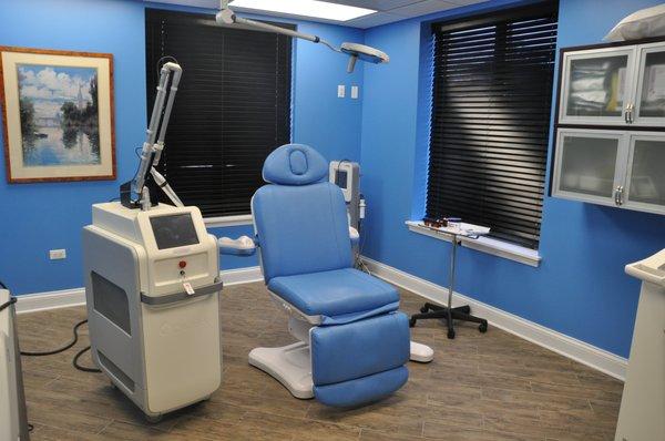 One of our Facial Plastic Surgery rooms along with our Tattoo Removal laser!