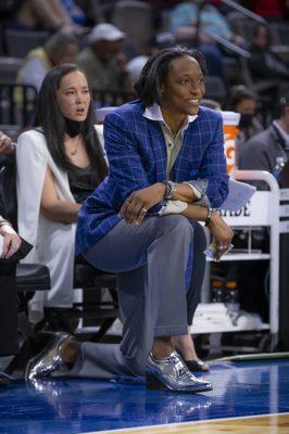 Berkeley Women's Basketball Coach Charmin Smith sporting Franco Uomo courtside at a game.