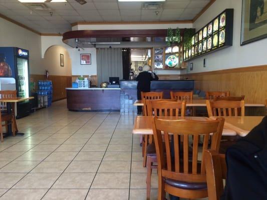 Seating for about 30. You can see the kitchen and cooks and appears clean