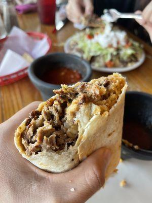 Super burrito and nachos. Both were large. Some of the asada was dry but it all had the nice char on it. Nothing adding salsa couldn't fix.