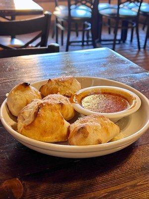 Stuffed (with cheese) Garlic Knots with included marinara dipping sauce.