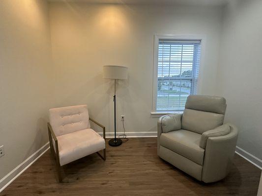 Designed for comfort, this space features a size-inclusive chair to ensure every client feels supported during lactation consultations.