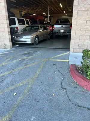 The garage is so crowded that they scratch the side of my car up when they pulled it out of the