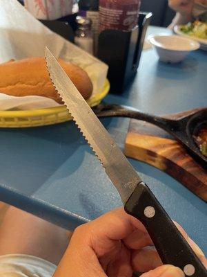 First dirty knife they gave me with hair stuck on the knife because the knife was so dirty/sticky.