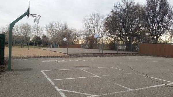 Playground area, basketball court and volleyball.