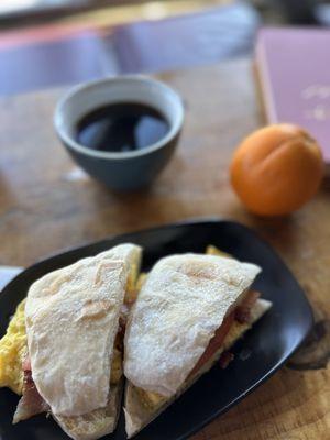 Standard breakfast sandwich on ciabatta bread.