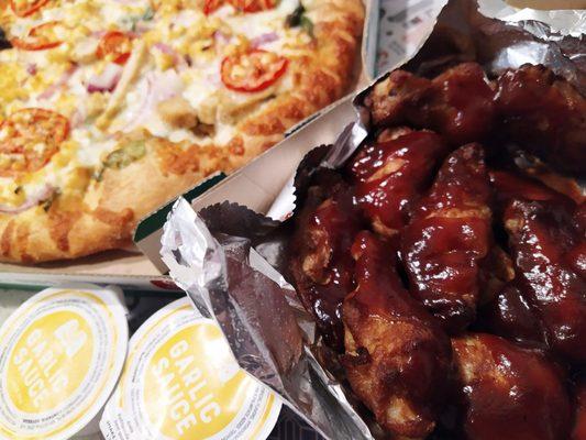 Speciality medium pizza and 15 bbq wings.