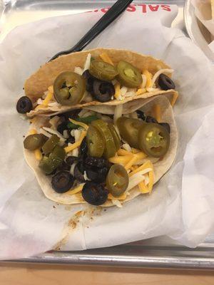 2 Tacos, very sloppy and who's gonna eat that many jalapeños in one bite?