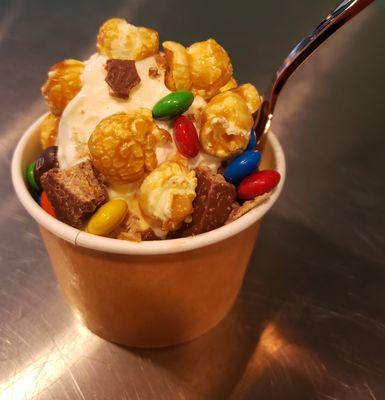 Caramel popcorn, KitKat pieces, and M&Ms, frozen vanilla custard