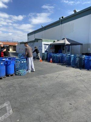 José in the recycling area