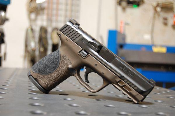 Midnight Bronze Cerakote frame on a new Smith & Wesson M&P9 M2.0 Compact.  These are also for sale in our store!!