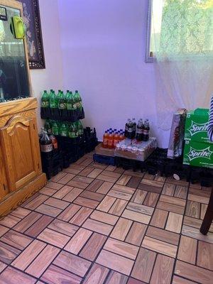 Drinks on the floor in the dining area.