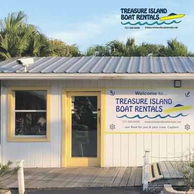 New owners and new Welcome Sign at Treasure Island Boat Rentals