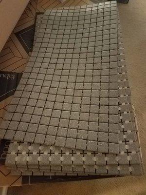 Day One mosaic tile for shower floor staged and ready to go