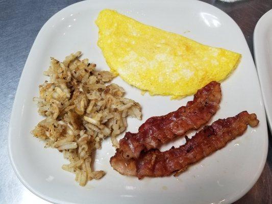 Cheese omelet with hashbrowns and bacon