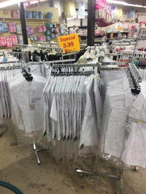 They have white guayaberas in all kids sizes. They also carry guayabera dresses for little girls.