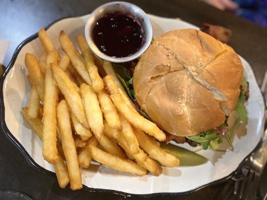 Huck Burger $14.99 with brie, bacon, pickled red onion and arugula topped with habanero huckleberry jam