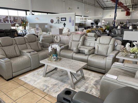 Top grain leather power reclining living room set with wireless charging and one-touch open and close.