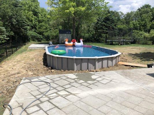 This 18'x33' Oasis, Semi-In-ground pool went in during a separate patio and shed pad project. We sunk the pool as much as safely allowed.