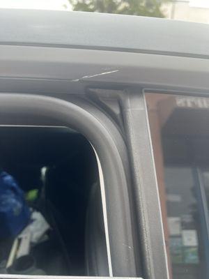 Scratched area above the window from the window malfunction on my 2024 model Y