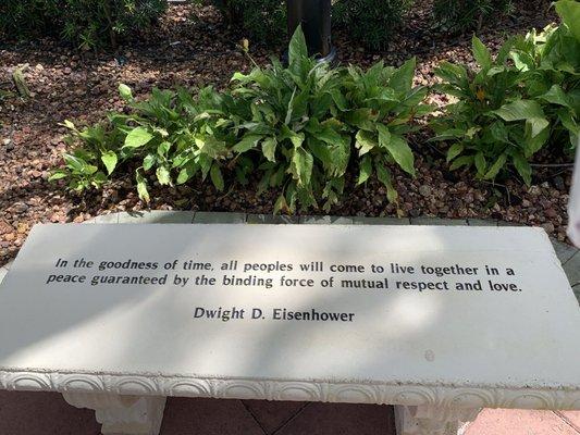 One of 14 hand carved stone benches with a quote in The Garden of Humanity designed by Yaacov Heller