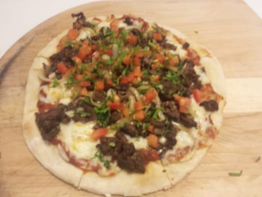 Carne asada pizza