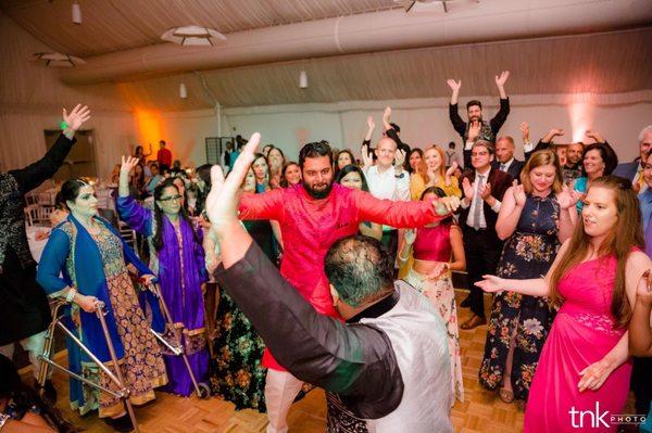 Reggie the Mc, teaching everyone how to dance to Indian music. He made sure we had a full dance floor.