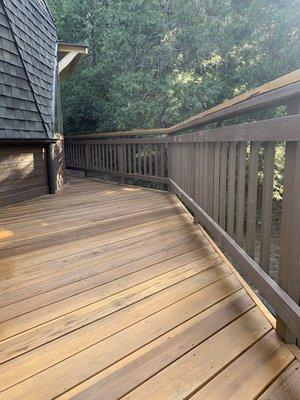 Semi transparent stain on deck.solid base stain on railing and entire exterior of cabin